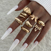 UNI-11115-7 - Bow & Mix Gold Foiled - Ring Set Of 8