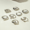 UNI-11115-8 - Bow & Mix Silver - Ring Set Of 8