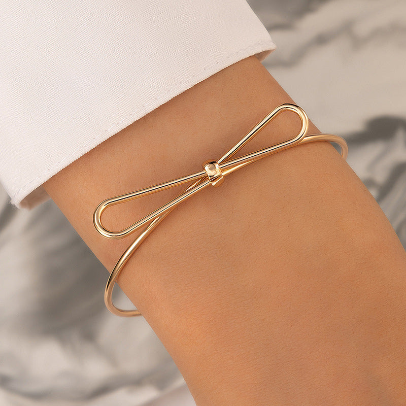 UNI-11095-1 - Bow Gold Bangle - Bracelet