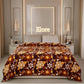 Brown floral printed blanket on bed in modern bedroom with Elore sign above headboard