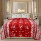 Red floral blanket on bed with floral pillows, modern bedroom décor, Elore sign on wall